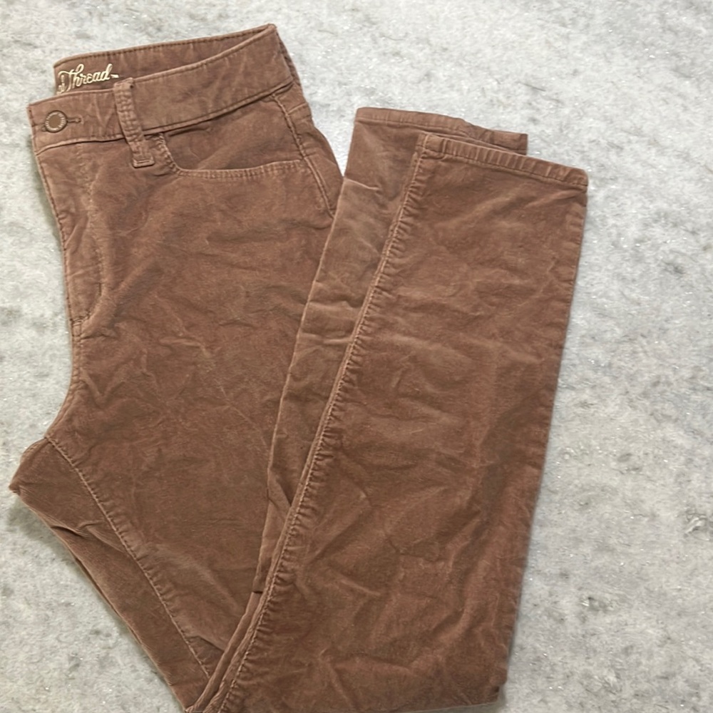 Dusty rose corduroy pants.